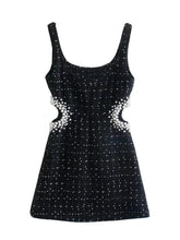 Robe mini à pierres précieuses Elle